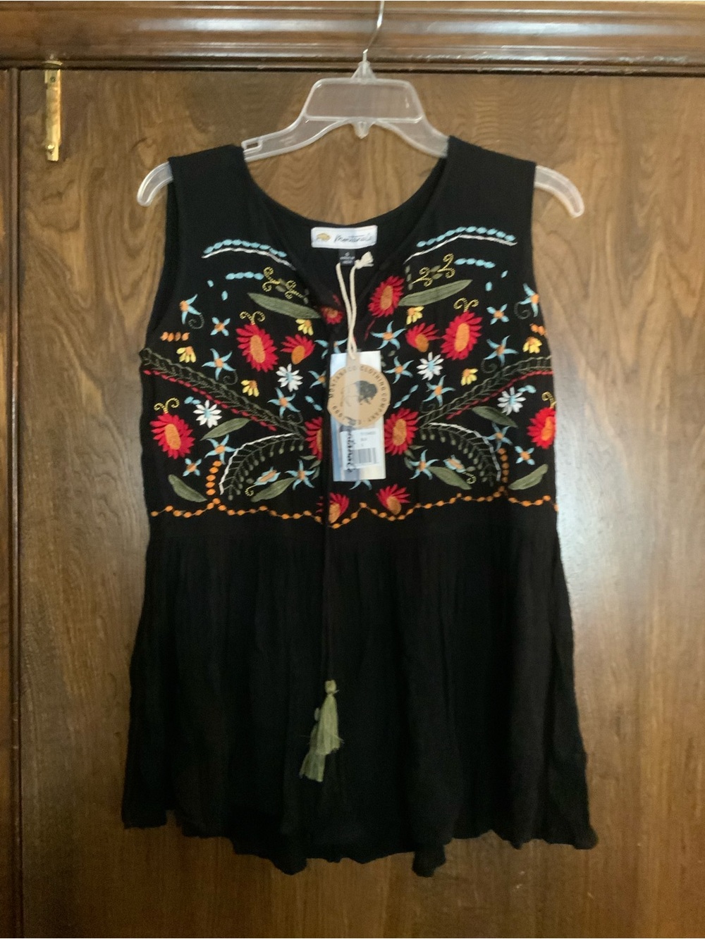 Mountain Clothing CompanyEmbroidered Black Sleeveless Boho Blouse with Tassel